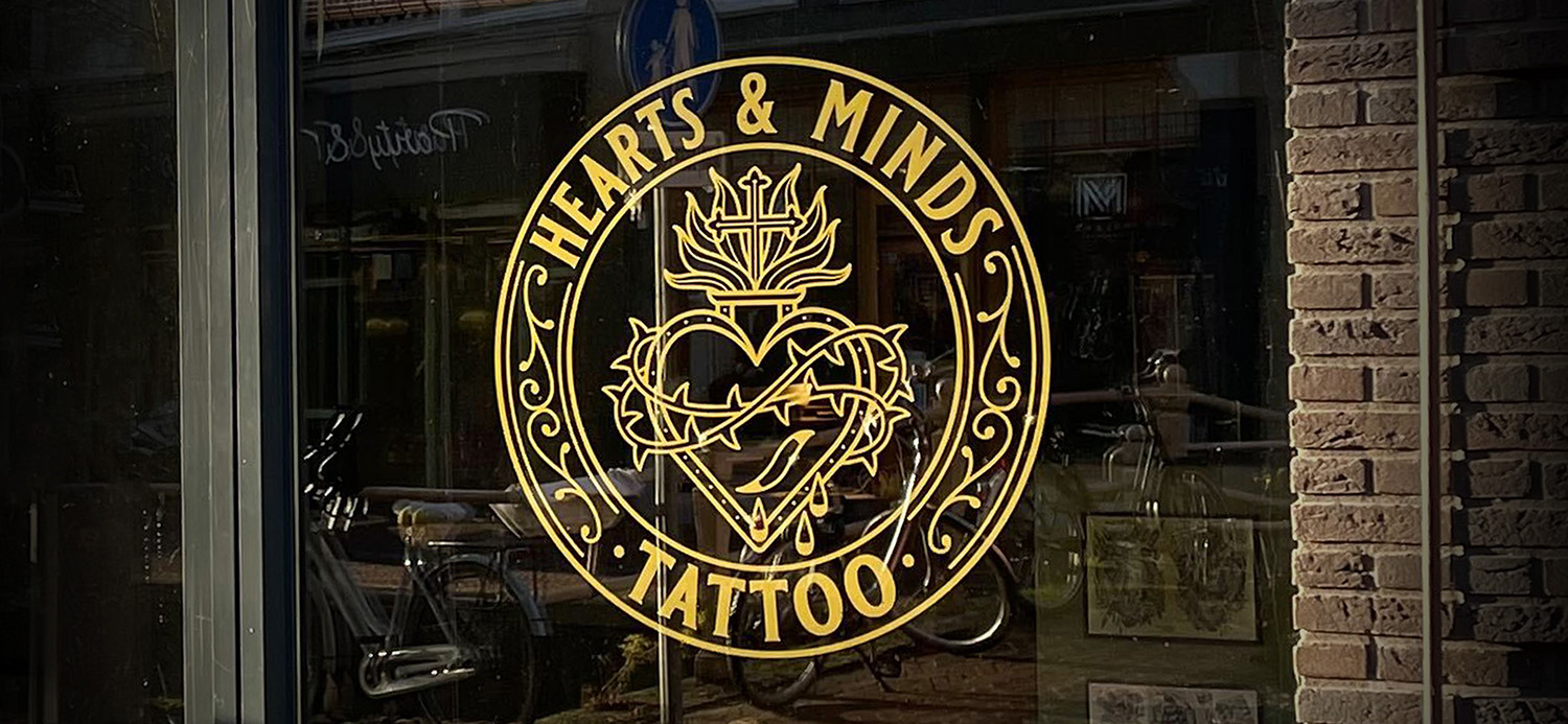 raamstickers bedrijf logo tattoo bedrijfslogo laten aanbrengen leeuwarden sneek drachten friesland signmaker reclamemaker